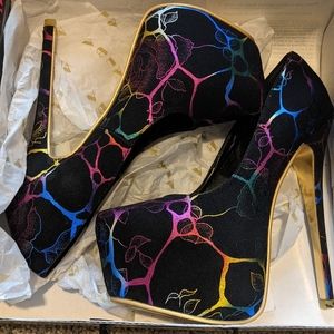 Like new multi colored platform heels.